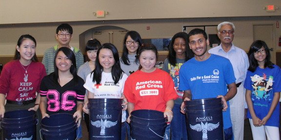 Alliance volunteers in Houston filling AICB buckets for flood affected families in Sinhd Pakistan    (17)