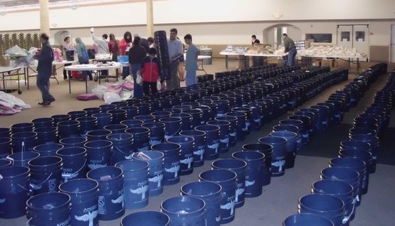 Alliance volunteers in Houston filling AICB buckets for flood affected families in Sinhd Pakistan    (20)
